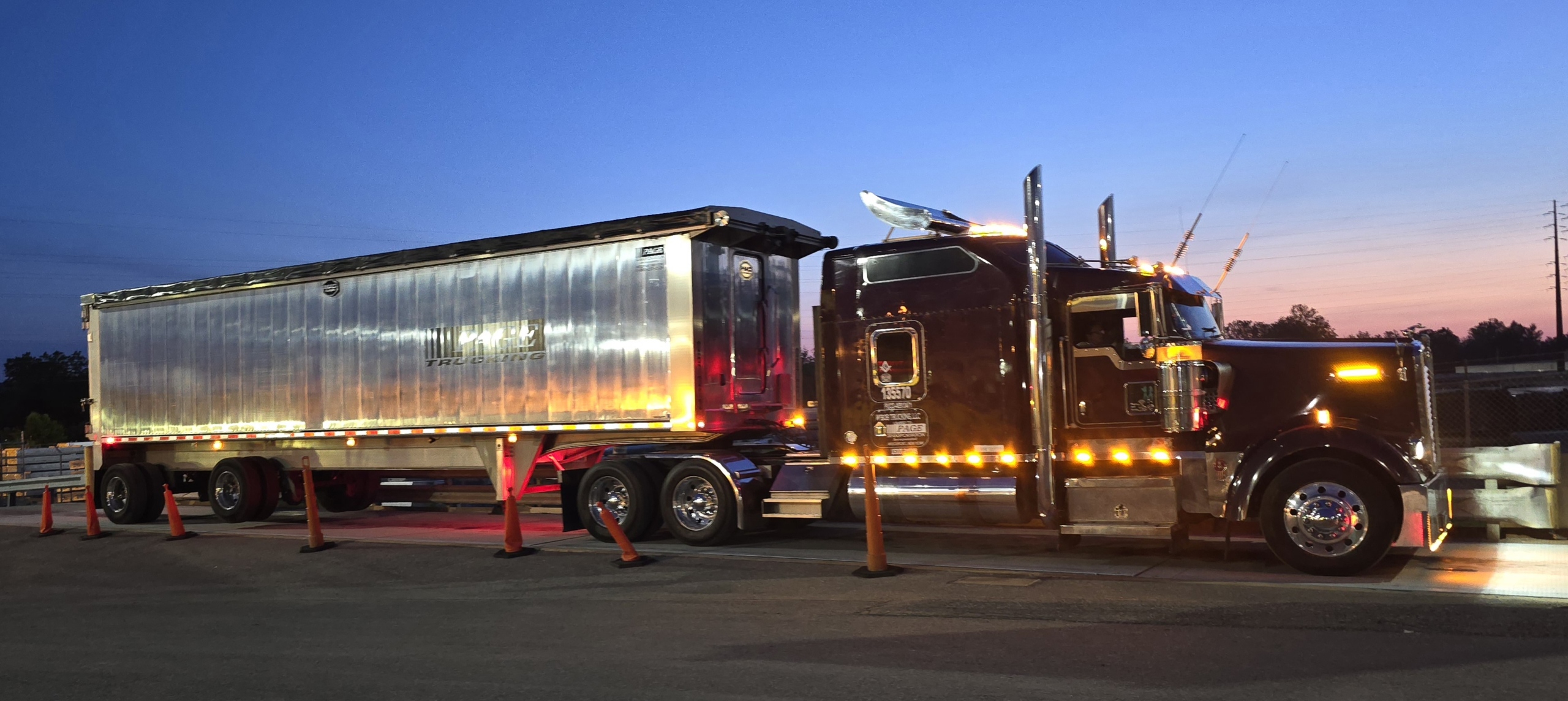 2006 Kenworth W900L at sunset with trailer